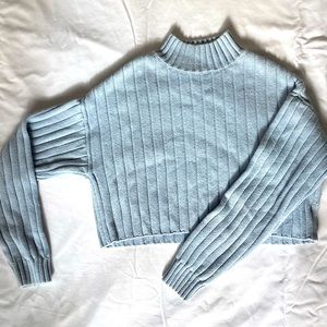 Light blue cropped mock-turtle neck sweater from PacSun.